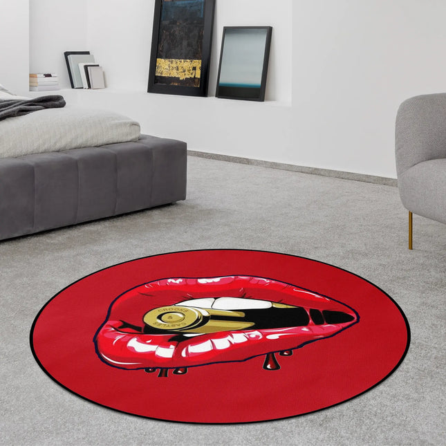 Red graphic round rug with lips and bullet design styled in a modern bedroom with Jet Black edge