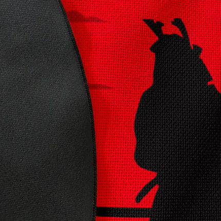 Close up of woven polyester material on Blood Moon Samurai graphic round rug with Jet Black edge showing crimson moon artwork and print texture