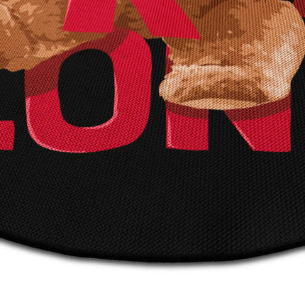 Close up of comfort zone graphic round rug Jet Black edge showing woven polyester detail