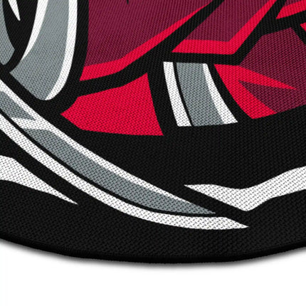 Close up of crimson bonsai round rug Jet Black edge showing woven polyester detail
