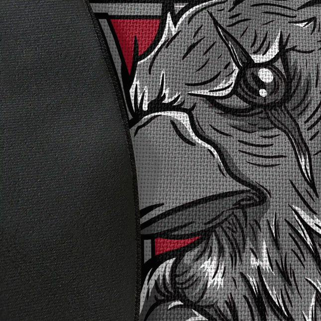Close up of woven polyester material on dark raven graphic round rug with Jet Black edge finish showing raven artwork and print detail