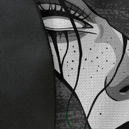 Close up of woven polyester material on fragmented soul graphic round rug with Jet Black edge showing distorted face artwork and print texture