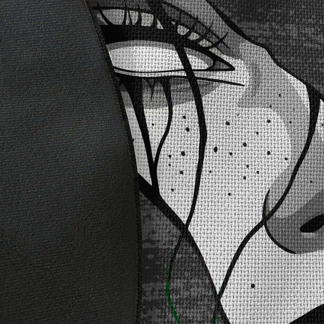 Close up of woven polyester material on fragmented soul graphic round rug with Jet Black edge showing distorted face artwork and print texture