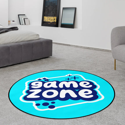 Turquoise game zone graphic round rug with bold blue and white text styled in a modern bedroom with Jet Black edge finish