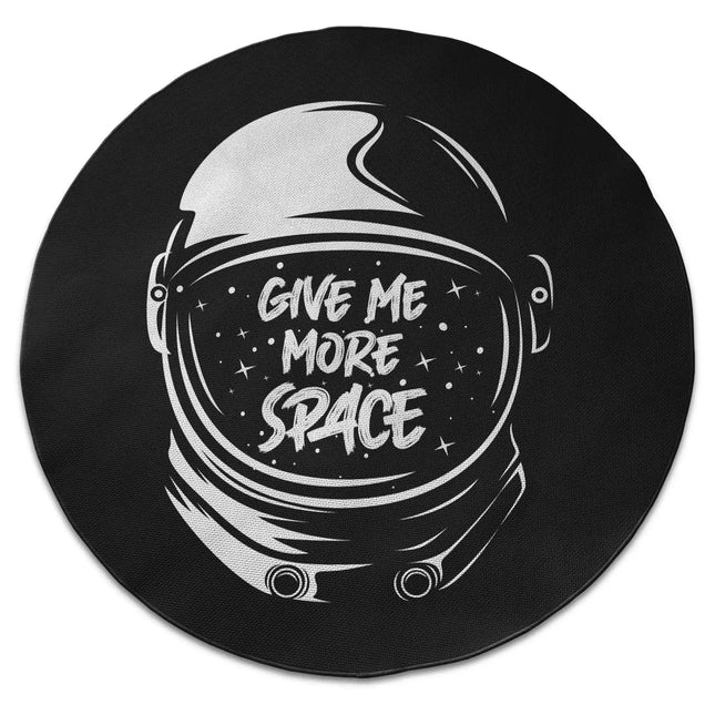 Give Me More Space graphic round rug with astronaut artwork shown from above on white background with Jet Black edge finish
