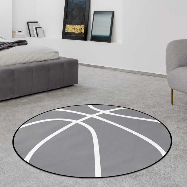 Grey basketball round rug with white line graphic styled in a modern bedroom with Jet Black edge finish