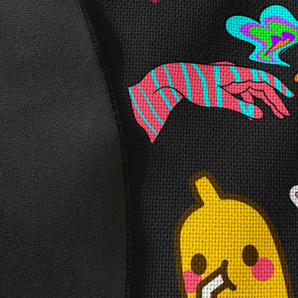 Close up of woven polyester material on Happy Chaos graphic round rug with Jet Black edge showing psychedelic cartoon artwork and print texture