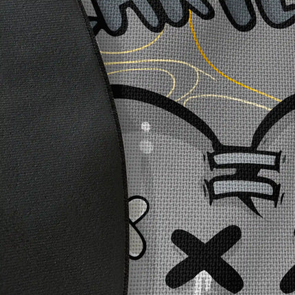 Close up of woven polyester material on Heartless graphic round rug with Jet Black edge showing stabbed heart artwork and print texture