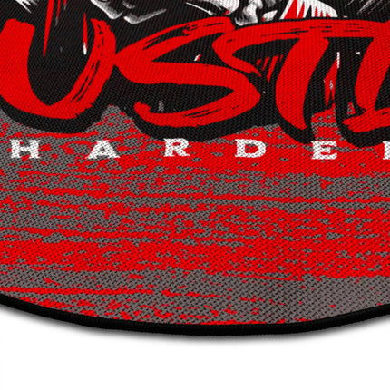 Close up of Hustle Harder graphic round rug with grim reaper artwork showing Jet Black edge and woven polyester texture
