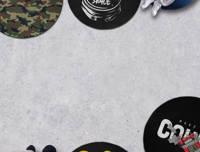 grey floor featuring four round rugs with people placing them on the ground. 30% off logo on the top left of the image with code 30OFF