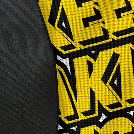 Close up of woven polyester material on Keep Taking Risk graphic round rug showing print texture with jet black edge finish