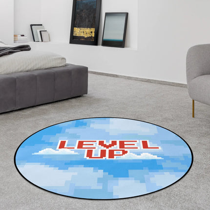 Blue pixel sky graphic round rug with “Level Up” text styled in a modern bedroom with Jet Black edge finish