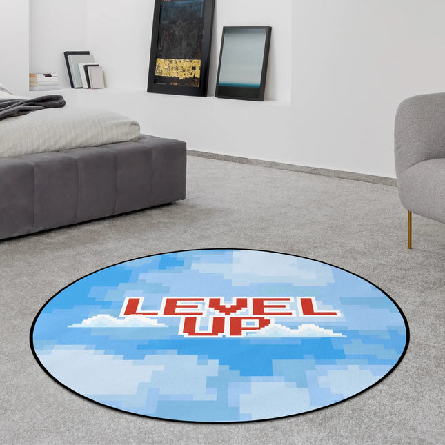 Blue pixel sky graphic round rug with “Level Up” text styled in a modern bedroom with Jet Black edge finish