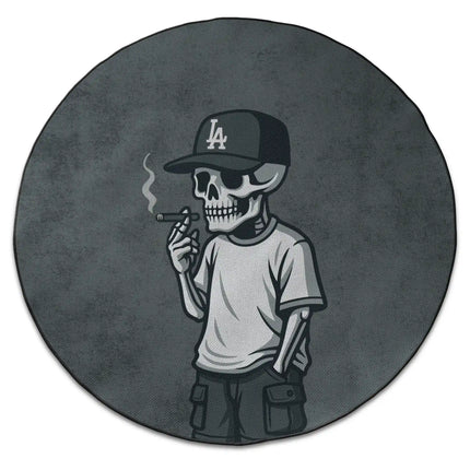 Lost angeles graphic round rug with smoking skeleton wearing LA cap and Jet Black edge finish shown from above on white background