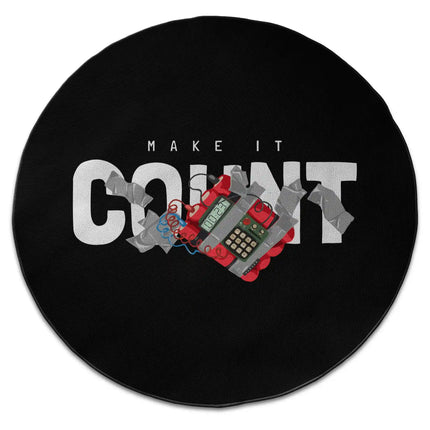 Make It Count graphic round rug with motivational typography artwork shown from above on white background with Jet Black edge finish