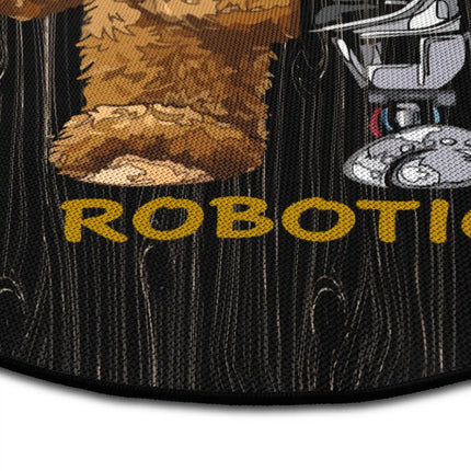 Close up of Mechanical Teddy graphic round rug with half teddy bear half robot artwork showing Jet Black edge and woven polyester texture