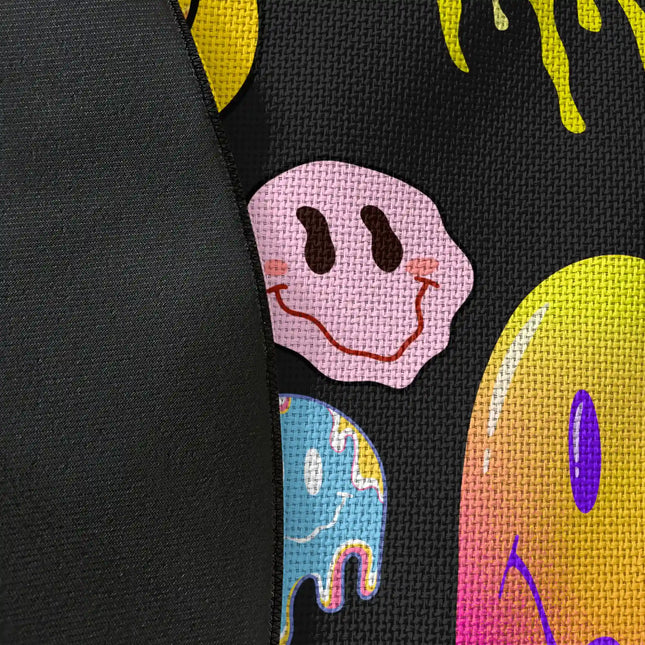 Close up of woven polyester material on Melted Mood graphic round rug with Jet Black edge showing colourful smiley artwork and print texture
