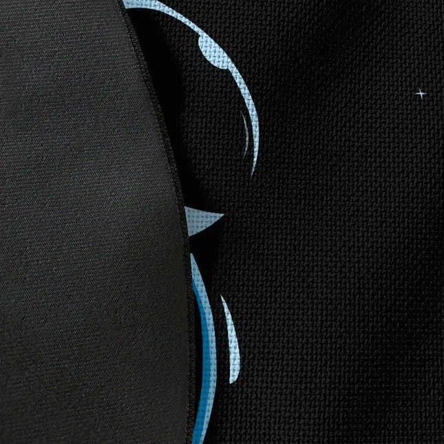 Close up of woven polyester material on midnight drifter graphic round rug with Jet Black edge finish showing astronaut and crescent moon print detail