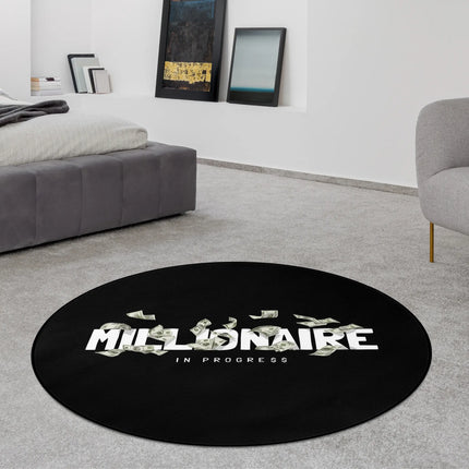Black millionaire in progress graphic round rug styled in a modern bedroom with Jet Black edge finish