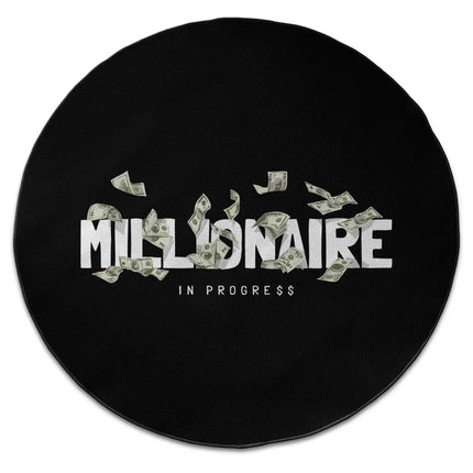 Millionaire in progress graphic round rug with Jet Black edge finish shown from above on white background