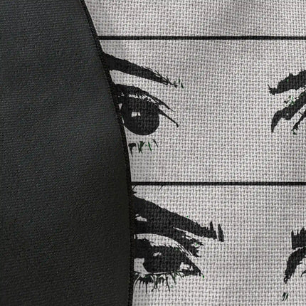 Close up of woven polyester material on mind reader graphic round rug with Jet Black edge showing fragmented eye artwork and print texture