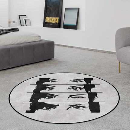 Mind reader graphic round rug with fragmented eye artwork styled in a modern bedroom with Jet Black edge finish