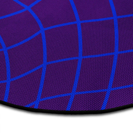Close up of Neon Drift abstract round rug with neon wave grid artwork showing Jet Black edge and woven polyester texture