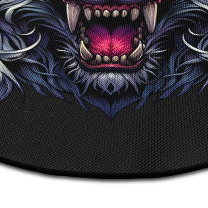 Close up of Neon Wolf graphic round rug with glowing cyber wolf artwork showing Jet Black edge and woven polyester texture