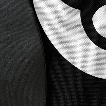 Close up of woven polyester material on number 8 ball graphic round rug with Jet Black edge finish showing detailed print texture