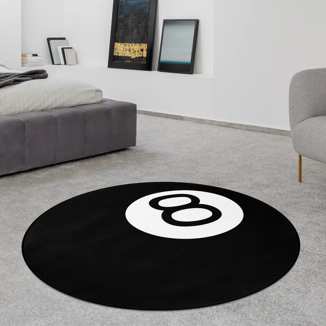 Black number 8 ball graphic round rug with white circle design styled in a modern bedroom with Jet Black edge finish