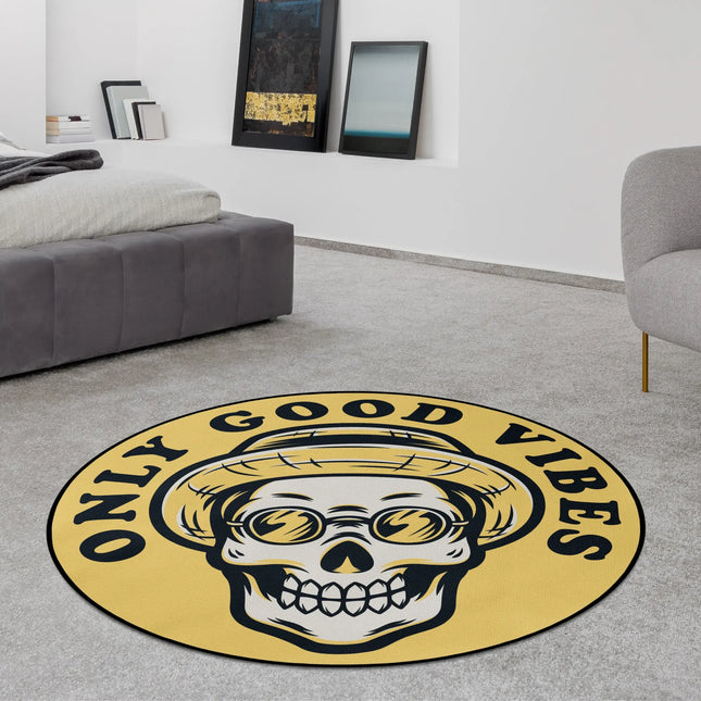 Yellow only good vibes graphic round rug with skull wearing straw hat and bold text styled in a modern bedroom with Jet Black edge finish