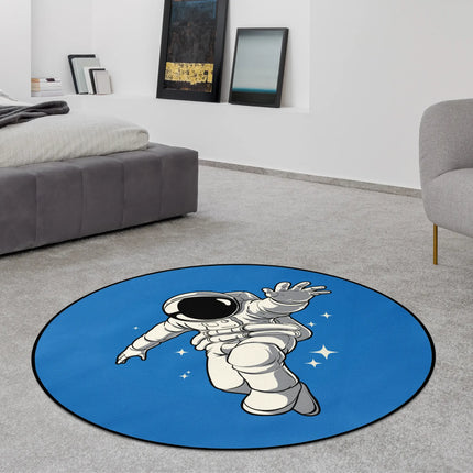 Blue orbit drifter graphic round rug with astronaut drifting through space styled in a modern bedroom with Jet Black edge finish