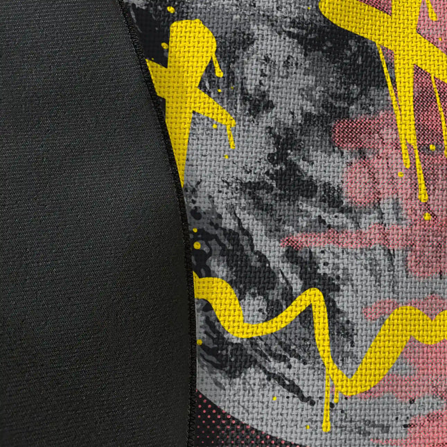 Close up of woven polyester material on phenomena graphic round rug with Jet Black edge finish showing moon face and graffiti print detail