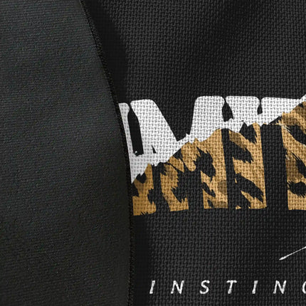 Close up of woven polyester material on primitive instinct graphic round rug with Jet Black edge finish showing print texture
