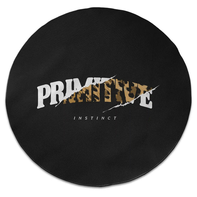 Primitive instinct graphic round rug with Jet Black edge finish shown from above on white background