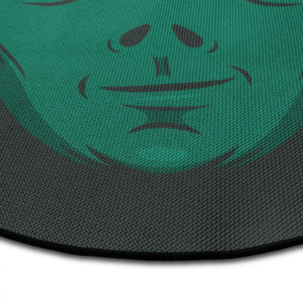 Close up of stay weird graphic round rug Jet Black edge showing woven polyester detail