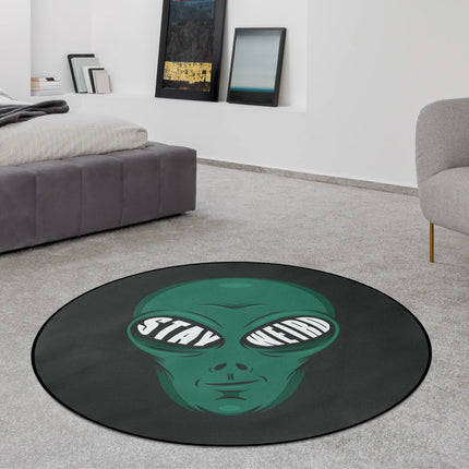Stay weird graphic round rug styled in a modern bedroom with Jet Black edge finish