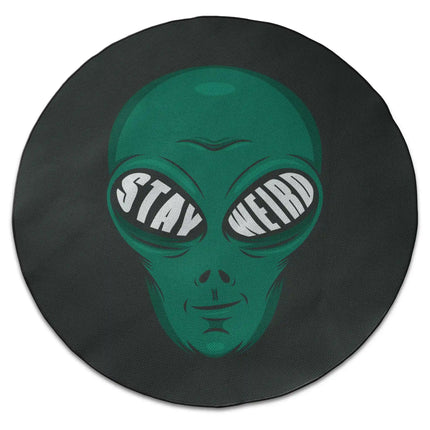 Stay weird graphic round rug with Jet Black edge finish shown from above on white background