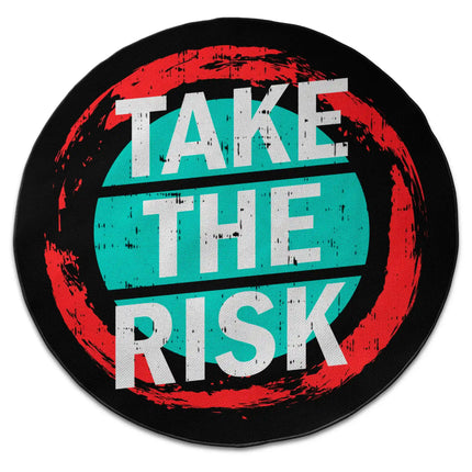 Take the risk graphic round rug with Jet Black edge finish shown from above on white background