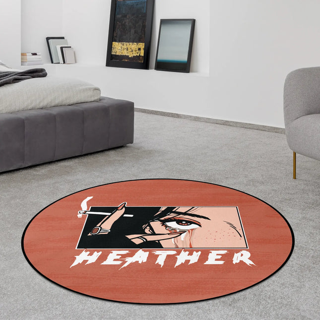 Tears and smoke graphic round rug with illustrated eye artwork, drifting smoke details and distressed typography styled in a modern bedroom with Jet Black edge finish