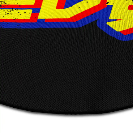 Close up of “The Game Is Not Over” round rug Jet Black edge showing woven polyester detail