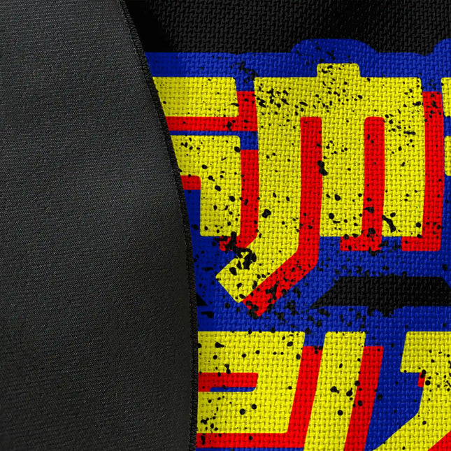 Close up of woven polyester material on “The Game Is Not Over” graphic round rug with Jet Black edge finish showing detailed print texture