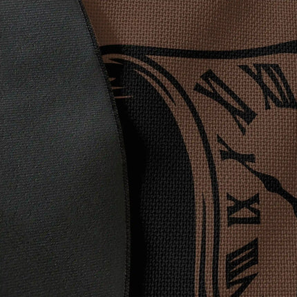Close up of woven polyester material on Time Collapse graphic round rug with Jet Black edge showing surreal melting clock artwork and print texture