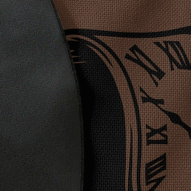 Close up of woven polyester material on Time Collapse graphic round rug with Jet Black edge showing surreal melting clock artwork and print texture
