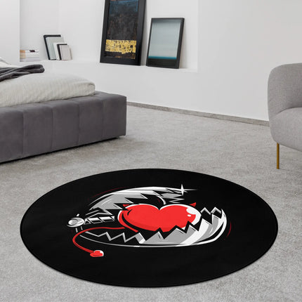 Black trapped heart graphic round rug styled in a modern bedroom with Jet Black edge finish