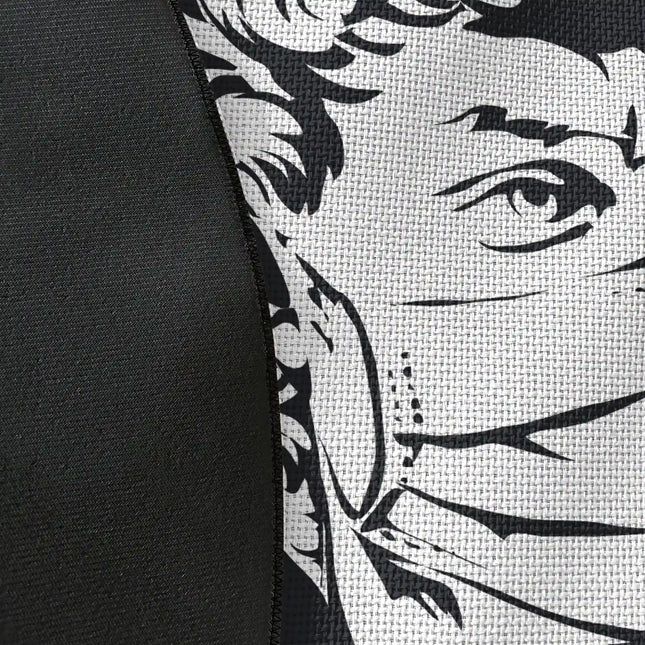 Close up of woven polyester material on trend setter graphic round rug with Jet Black edge finish showing print texture