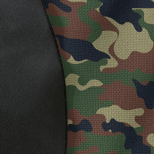 Close up of woven polyester material on woodland camo graphic round rug with Jet Black edge finish showing camouflage print detail