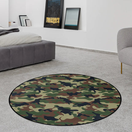 Woodland camo graphic round rug with green brown and black camouflage pattern styled in a modern bedroom with Jet Black edge finish