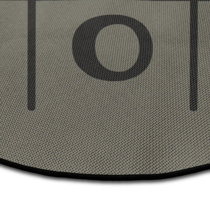 Close up of XO Grid graphic round rug with tic tac toe artwork showing Jet Black edge and woven polyester texture