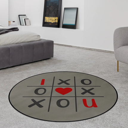 XO Grid graphic round rug with tic tac toe inspired design styled in a modern bedroom with Jet Black edge finish